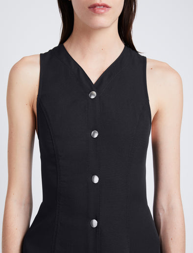 Detail image of model wearing Drapey Suiting Button Front Dress in BLACK