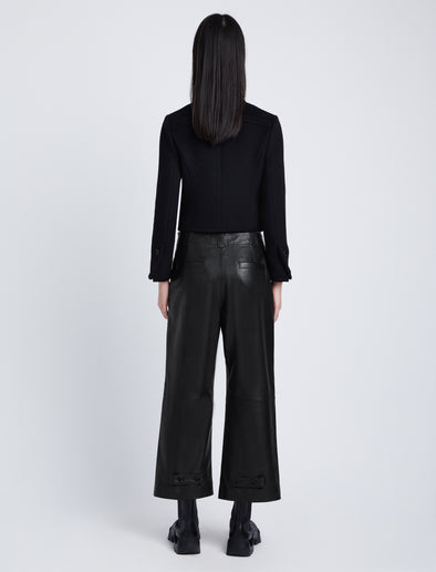 Back full length image of model wearing Kay Leather Pant in BLACK