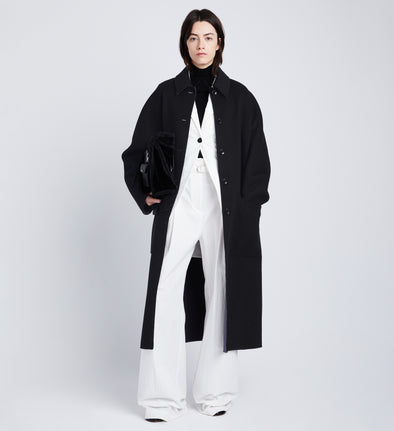 Front full length image of model wearing Reversible Double Face Coat in BLACK / STEEL GREY on BLACK side