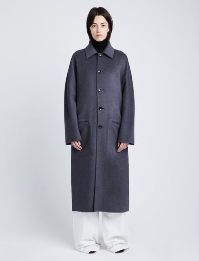 Front full length image of model wearing Reversible Double Face Coat in BLACK / STEEL GREY on STEEL GREY side