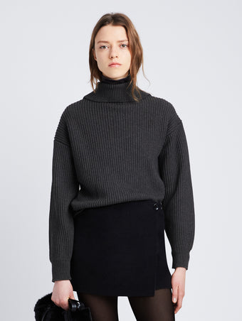 Cropped front image of model wearing Reversible Cotton Cashmere Sweater in CHARCOAL