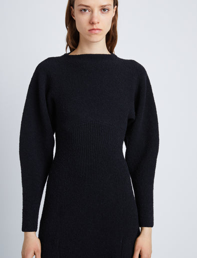 Detail image of model wearing Wool Viscose Boucle Dress in BLACK