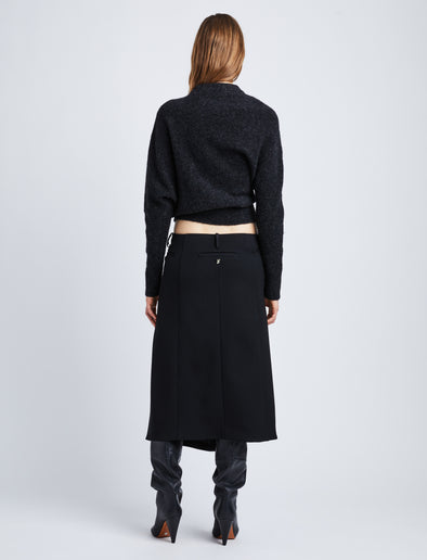 Back full length image of model wearing Wool Twill Skirt in BLACK