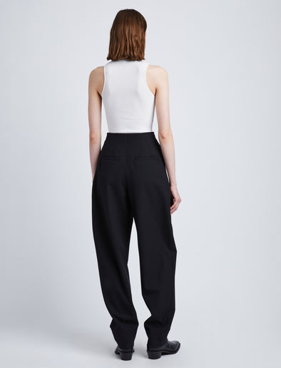 Back full length image of model wearing Matte Viscose Knit Top in WHITE