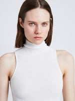 Detail image of model wearing Matte Viscose Knit Top in WHITE