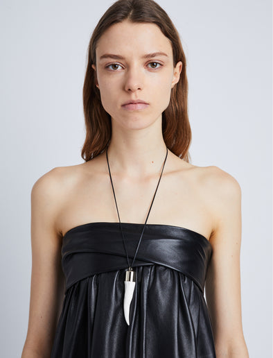 Image of model wearing Horn Necklace in WHITE/GOLD