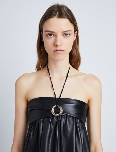 Image of model wearing 3 Ring Necklace in GOLD/GOLD/SILVER