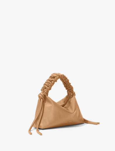 Side image of Mini Drawstring Bag in SAND