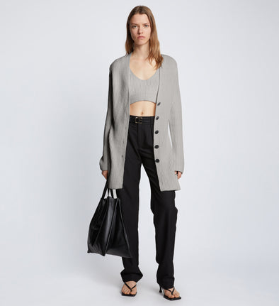 Front full length image of model wearing Ribbed Cotton Relaxed Cardigan in GREY MELANGE with belt removed