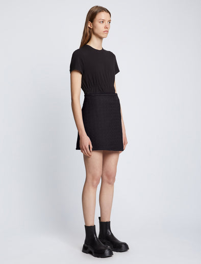 Side full length image of model wearing Tweed Wrap Skirt in BLACK