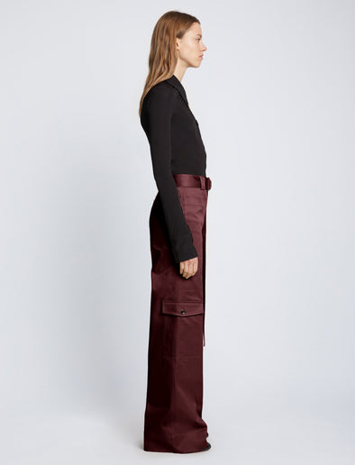 Side full length image of model wearing Cotton Twill Cargo Pants in PLUM