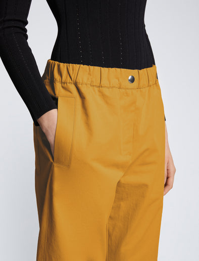 Detail image of model wearing Solid Cotton Linen Easy Pants in GOLD