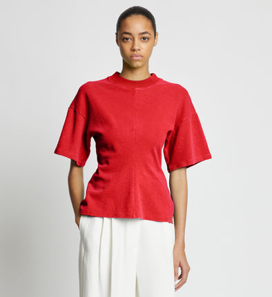 Front cropped image of model wearing Eco Cotton Waisted T-Shirt in POPPY