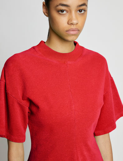 Detail image of model wearing Eco Cotton Waisted T-Shirt in POPPY