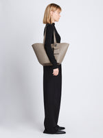 Image of model wearing Large Bedford Tote In Leather in clay