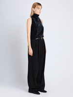 Side image of model in Mila Cowl Top In Chenille Suiting in black