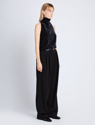 Side image of model in Mila Cowl Top In Chenille Suiting in black