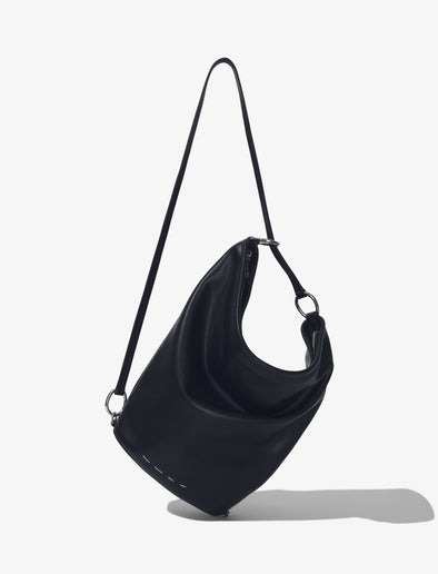 Front image of image of Spring Bag In Leather in black worn as a sling