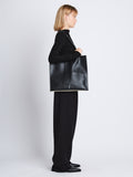 Image of model wearing Twin Tote In Leather in black/ivory