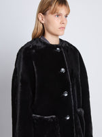 Detail image of model wearing Penelope Coat in BLACK