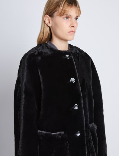 Detail image of model wearing Penelope Coat in BLACK