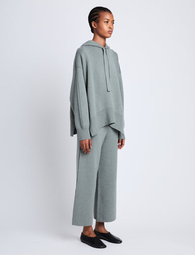 Side full length image of model wearing Cleo Sweatshirt in POPLAR/BLACK