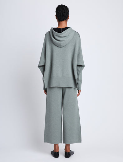 Back full length image of model wearing Cleo Sweatshirt in POPLAR/BLACK