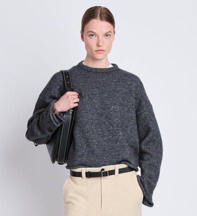 Front cropped image of model wearing Tara Sweater in GREY MELANGE