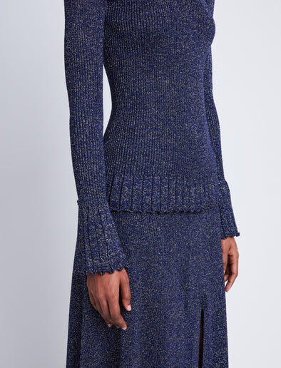 Detail image of model wearing Avery Turtleneck in ROYAL BLUE/SILVER