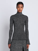 Cropped front image of model wearing Avery Turtleneck in BLACK/SILVER