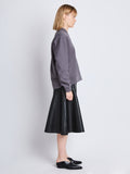 Side full length image of model wearing Olivia Sweatshirt in GRAPHITE