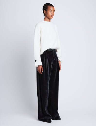 Side full length image of model wearing Aria Pant in BLACK