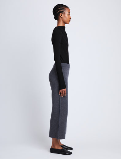 Side full length image of model wearing Grace Pant in DARK GREY/ BLUE