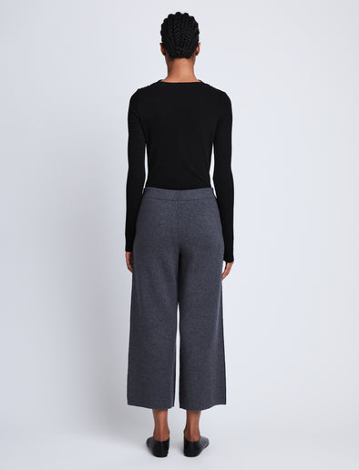 Back full length image of model wearing Grace Pant in DARK GREY/ BLUE