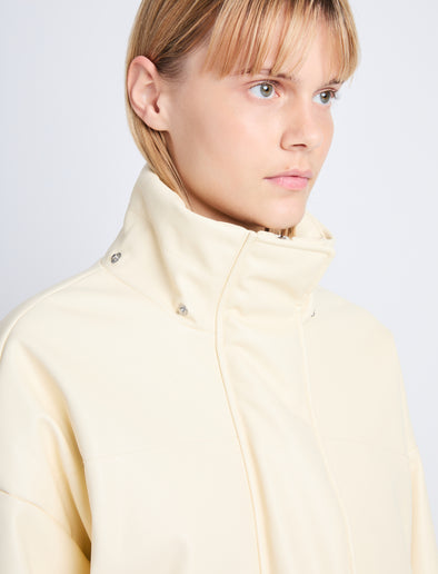 Detail image of model in Daylia Jacket In Faux Leather in parchment