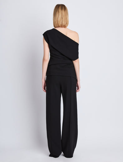 Back full length image of model wearing Francesa Off The Shoulder Top in BLACK