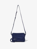 Front image of Suede Beacon Bag in DEEP NAVY with strap extended