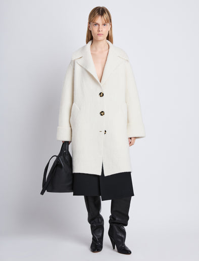 Front image of model wearing Ruth Coat In Knit Outerwear in ivory