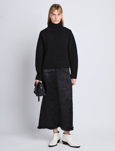 Front image of model wearing Alma Sweater In Lofty Eco Cashmere in black