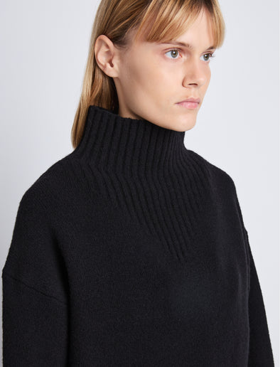 Detail image of model wearing Alma Sweater In Lofty Eco Cashmere in black