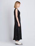 Side image of model wearing Mira Dress In Embroidered Crushed Satin in black