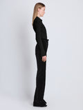 Side full length image of model wearing Midweight Viscose Rib Cardigan in BLACK  Edit alt text