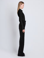 Side full length image of model wearing Midweight Viscose Rib Cardigan in BLACK  Edit alt text