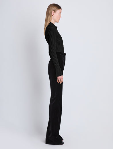 Side full length image of model wearing Midweight Viscose Rib Cardigan in BLACK Edit alt text