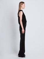 Side image of model wearing Marie Pant In Velvet Suiting in black multi