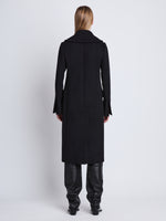 Back image of model wearing Louise Coat In Wool Cashmere in black