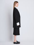 Side full length image of model wearing Henri Coat in BLACK