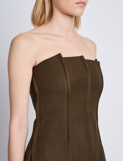 Detail image of model wearing Corinne Strapless Top in DARK LODEN