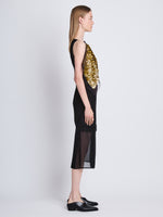Side full length image of model wearing Zaha Dress In Embroidered Metallic Silk in BLACK MULTI