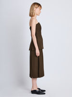 Side full length image of model wearing Diane Skirt in DARK LODEN